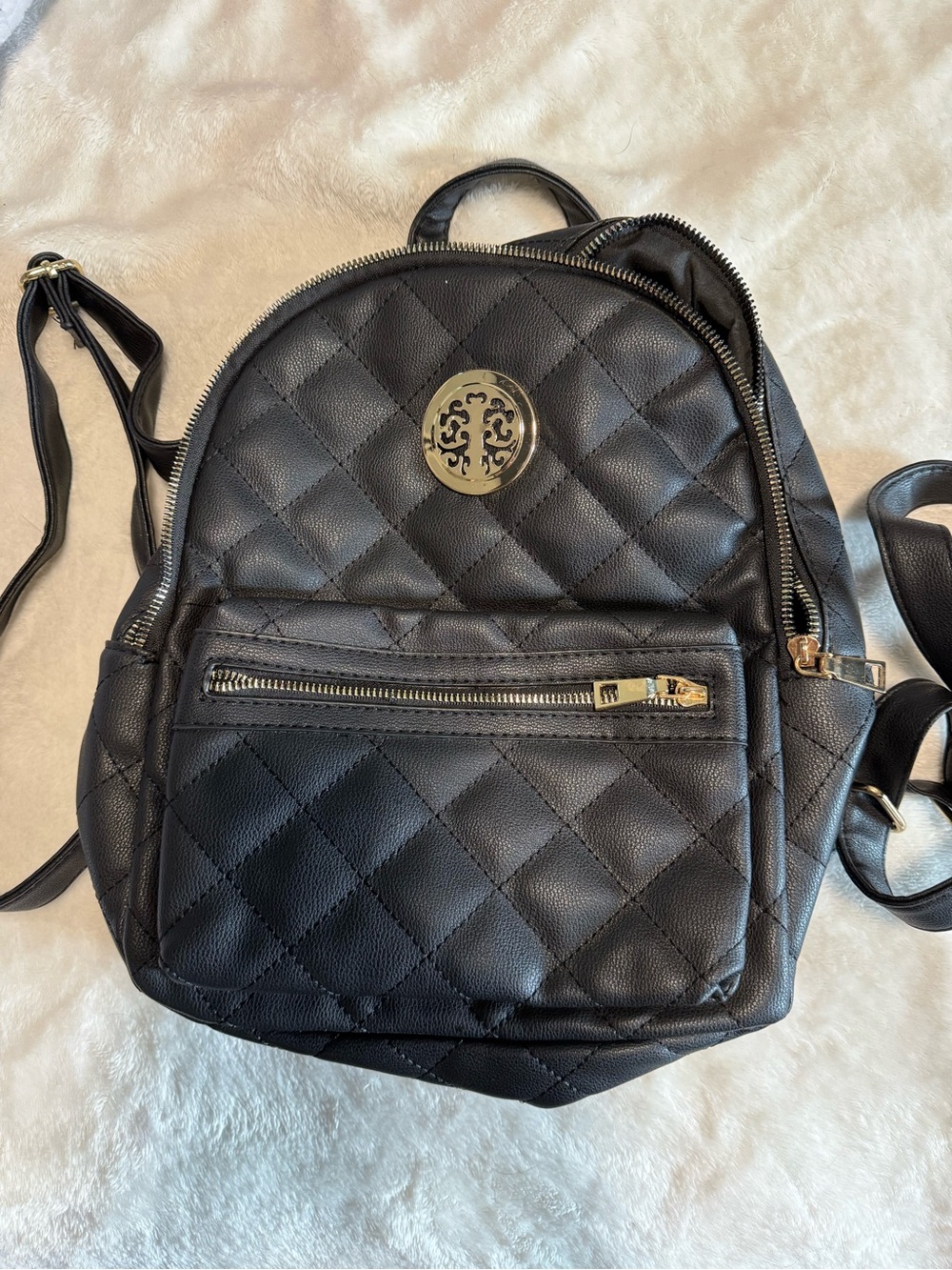 Quilted Black Mini Backpack with Gold Accent
